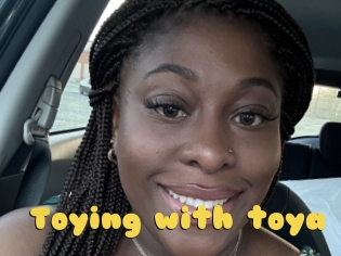 Toying_with_toya